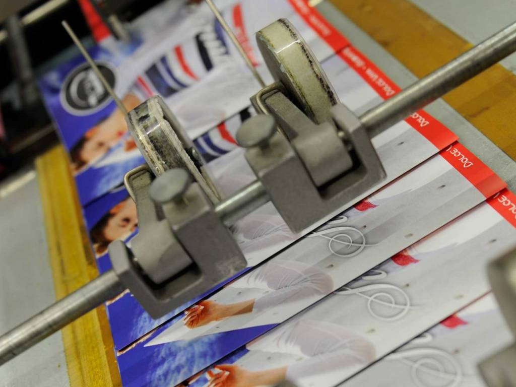 Geniet  gebrocheerd, afwerking drukkerij